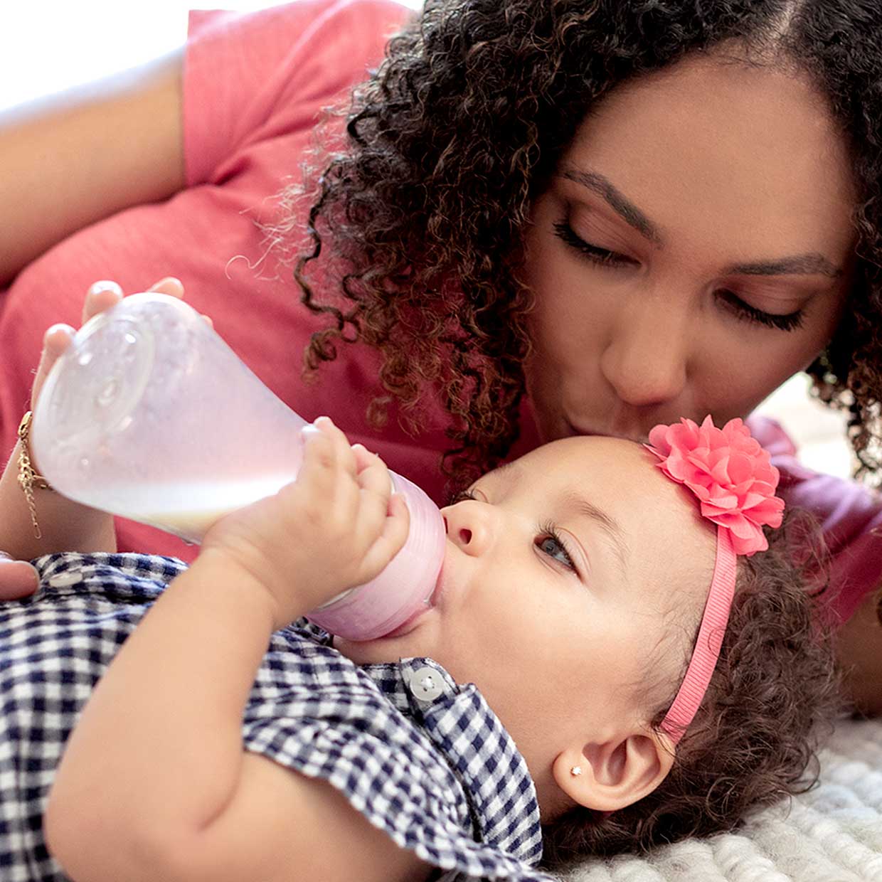 When Do Babies Hold Their Own Bottle or Cup?